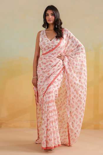 Anshu Wadhwa_Pink Cotton V-neck Floral Print Saree With Corset _at_Aza_Fashions