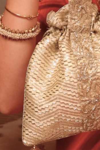 Amyra Gold Embroidery, Beads, Zari, Tassels Sunehri Top Handle Potli at Aza Fashions Amyra_Gold Embroidery, Beads, Zari, Tassels Sunehri Top Handle Potli _at_Aza_Fashions