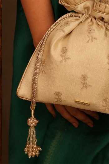 Buy Amyra Beige Embroidery, Sequins, Beads, Tassels Arohi Potli Buy_Amyra_Beige Embroidery, Sequins, Beads, Tassels Arohi Potli