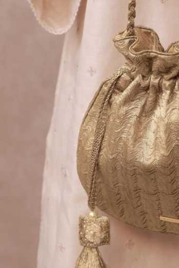 Shop Amyra Gold Beads, Tassels, Gota Patti, Metallic Thread Inej Textured Potli Online at Aza Fashions Shop_Amyra_Gold Beads, Tassels, Gota Patti, Metallic Thread Inej Textured Potli _Online_at_Aza_Fashions