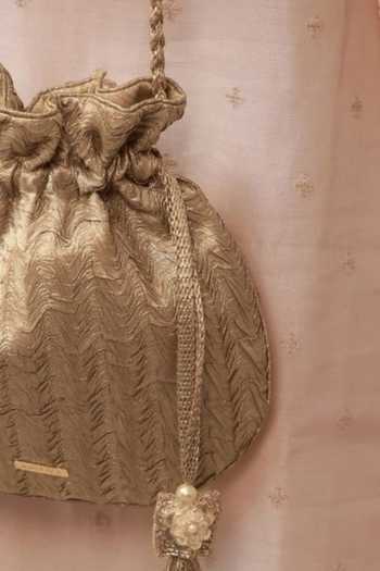 Amyra Gold Beads, Tassels, Gota Patti, Metallic Thread Inej Textured Potli at Aza Fashions Amyra_Gold Beads, Tassels, Gota Patti, Metallic Thread Inej Textured Potli _at_Aza_Fashions
