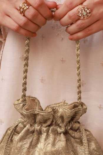 Buy Amyra Gold Beads, Tassels, Gota Patti, Metallic Thread Inej Textured Potli Buy_Amyra_Gold Beads, Tassels, Gota Patti, Metallic Thread Inej Textured Potli
