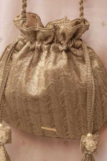 Shop Amyra Gold Beads, Tassels, Gota Patti, Metallic Thread Inej Textured Potli Shop_Amyra_Gold Beads, Tassels, Gota Patti, Metallic Thread Inej Textured Potli