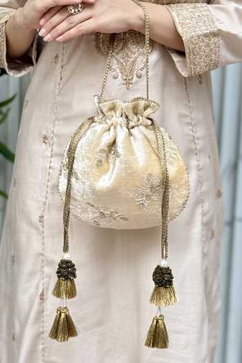 Shop Amyra Off White Embroidery, Beads, Tassels Ras Velvet Potli Shop_Amyra_Off White Embroidery, Beads, Tassels Ras Velvet Potli