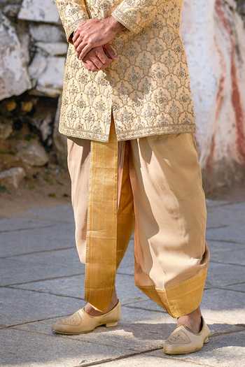 Shop_Tira by Naresh Raj_Gold Silk, Tissue Zari Heavy Embroidered Sherwani With Dhoti Pant _Online_at_Aza_Fashions