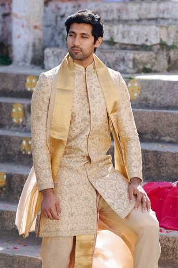 Shop_Tira by Naresh Raj_Gold Silk, Tissue Zari Heavy Embroidered Sherwani With Dhoti Pant 