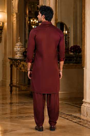 Shop Jhambthreads Maroon Cotton Satin Solid Kurta And Salwar Set at Aza Fashions Shop_Jhambthreads_Maroon Cotton Satin Solid Kurta And Salwar Set _at_Aza_Fashions