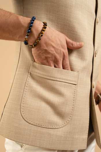 Shop Gargee Designers Beige Polyester Linen Look Patch Pocket Down Vest Online at Aza Fashions Shop_Gargee Designers_Beige Polyester Linen Look Patch Pocket Down Vest _Online_at_Aza_Fashions