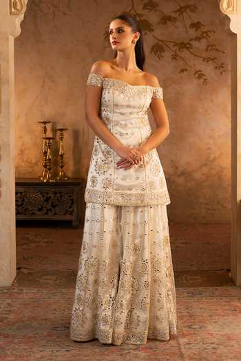 ANGAD SINGH Ivory Net Off-shoulder, Yes Embroidered Kurta Sharara Set at Aza Fashions ANGAD SINGH_Ivory Net Off-shoulder, Yes Embroidered Kurta Sharara Set _at_Aza_Fashions