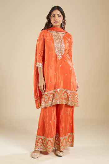 Shop Khwaab By Sanjana Lakhani Orange Crepe Round Neck Embroidered Kurta Sharara Set Online at Aza Fashions Shop_Khwaab By Sanjana Lakhani_Orange Crepe Round Neck Embroidered Kurta Sharara Set _Online_at_Aza_Fashions