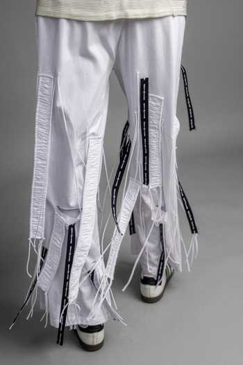 Buy Saim White Cotton Cut Outt Fringed Trouser Online at Aza Fashions Buy_Saim_White Cotton Cut Outt Fringed Trouser _Online_at_Aza_Fashions
