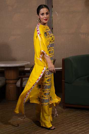 Saim Yellow Silk Round Neck Deconstructed Buttons Kaftan And Trouser Set Online at Aza Fashions Saim_Yellow Silk Round Neck Deconstructed Buttons Kaftan And Trouser Set _Online_at_Aza_Fashions