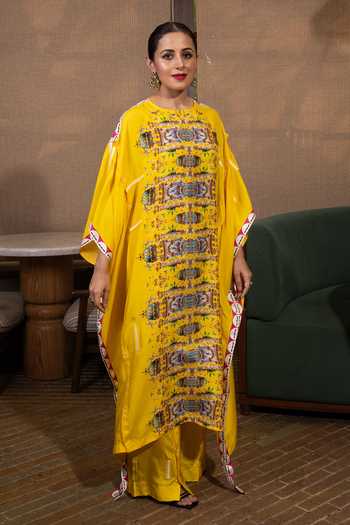 Buy Saim Yellow Silk Round Neck Deconstructed Buttons Kaftan And Trouser Set Online at Aza Fashions Buy_Saim_Yellow Silk Round Neck Deconstructed Buttons Kaftan And Trouser Set _Online_at_Aza_Fashions