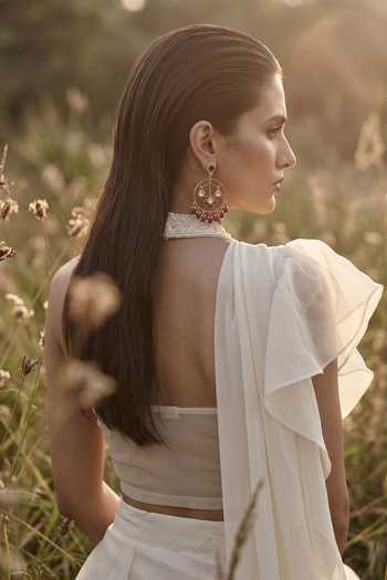 Basanti Kapde aur Koffee_Ivory Organza Halter Neck Ruffle Draped Saree And Blouse Set _Online_at_Aza_Fashions