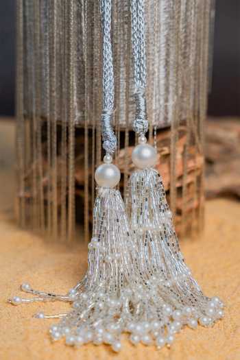 Nayaab By Sonia_Silver Pearls, Crystals, Tassels, Fringe Hinted Cascade Burst Potli Bag _Online_at_Aza_Fashions