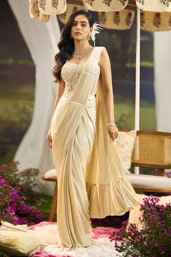 Aariyana Couture Cream Net, Lycra Sweetheart Neck Pre-draped Saree With Embroidered Corset Online at Aza Fashions Aariyana Couture_Cream Net, Lycra Sweetheart Neck Pre-draped Saree With Embroidered Corset _Online_at_Aza_Fashions