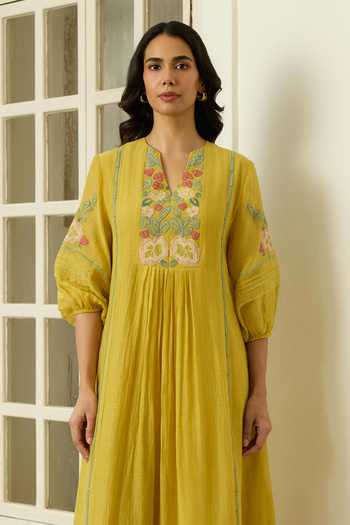 Buy Vaayu Yellow Cotton, Muslin Split V-neck Marigold Applique Work Dress Online at Aza Fashions Buy_Vaayu_Yellow Cotton, Muslin Split V-neck Marigold Applique Work Dress _Online_at_Aza_Fashions