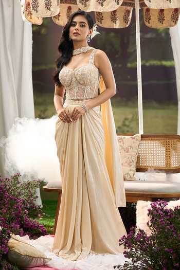 Shop Aariyana Couture Cream Net Sweetheart Neck Embroidered Blouse Draped Skirt Set Online at Aza Fashions Shop_Aariyana Couture_Cream Net Sweetheart Neck Embroidered Blouse Draped Skirt Set _Online_at_Aza_Fashions
