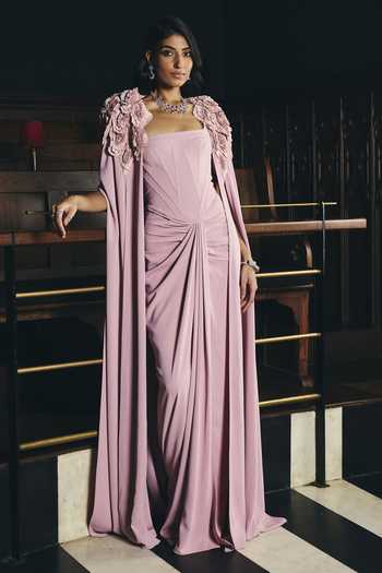 Supria Munjal_Pink Crepe Fabric Flowers Bandeau Neck Strapless Gown With Embellished Cape _at_Aza_Fashions