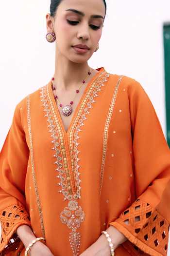 Shop Pink City by Sarika Orange Silk V-neck Saffron Embroidered Kurta And Dhoti Pant Set Shop_Pink City by Sarika_Orange Silk V-neck Saffron Embroidered Kurta And Dhoti Pant Set