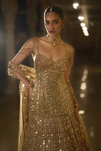 Seema Gujral Gold Net Sweetheart Neck Stone Embellished Lehenga Set Online at Aza Fashions Seema Gujral_Gold Net Sweetheart Neck Stone Embellished Lehenga Set _Online_at_Aza_Fashions