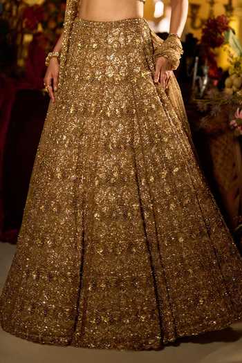Seema Gujral_Gold Net Halter Neck Sequin Embroidered Bridal Lehenga Set _Online_at_Aza_Fashions