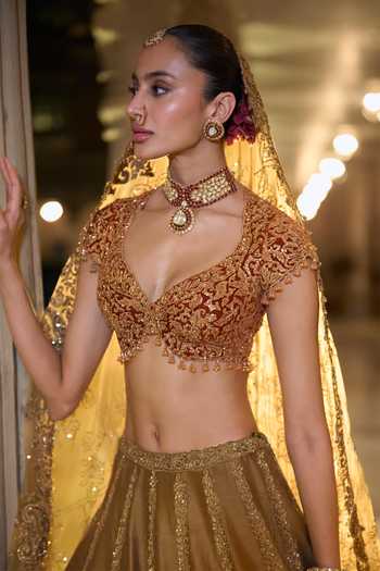 Buy Seema Gujral Gold Velvet, Silk, Net Sweetheart Neck Paisley Embroidered Lehenga Set Online at Aza Fashions Buy_Seema Gujral_Gold Velvet, Silk, Net Sweetheart Neck Paisley Embroidered Lehenga Set _Online_at_Aza_Fashions
