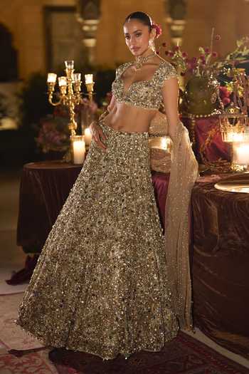 Buy_Seema Gujral_Gold Net Sweetheart Neck Jeweled Embroidered Lehenga Set _Online_at_Aza_Fashions