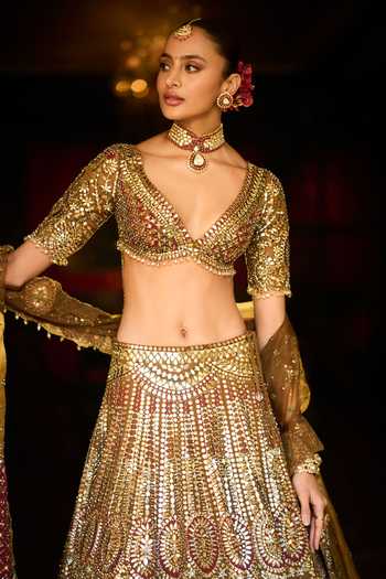 Shop_Seema Gujral_Gold Organza Plunge Neck Applique Mirror Work Bridal Lehenga Set _Online_at_Aza_Fashions