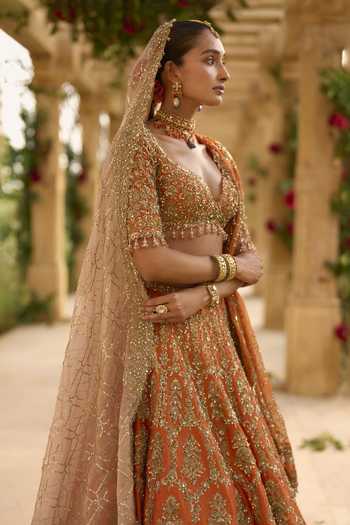 Seema Gujral Orange Silk, Organza Sweetheart Neck Zardozi Work Bridal Lehenga Set at Aza Fashions Seema Gujral_Orange Silk, Organza Sweetheart Neck Zardozi Work Bridal Lehenga Set _at_Aza_Fashions