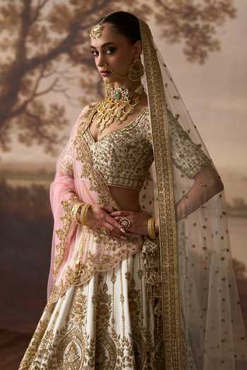 Buy ANGAD SINGH Ivory Silk V-neck Noor Embroidered Bridal Lehenga Set Buy_ANGAD SINGH_Ivory Silk V-neck Noor Embroidered Bridal Lehenga Set