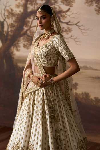 Buy ANGAD SINGH Ivory Silk V-neck Chandni Raw Bridal Lehenga Blouse Set Buy_ANGAD SINGH_Ivory Silk V-neck Chandni Raw Bridal Lehenga Blouse Set