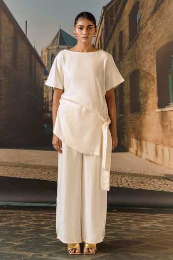 Maison Aguise Off White Satin Boat Neck Ecru Draped Top And Pant Set at Aza Fashions Maison Aguise_Off White Satin Boat Neck Ecru Draped Top And Pant Set _at_Aza_Fashions