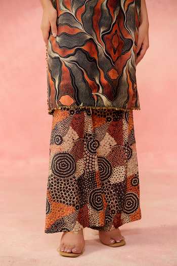 Label Moni K_Orange Crepe Halter Neck, Yes Savanna Circle Print Kurta And Palazzo Set _at_Aza_Fashions
