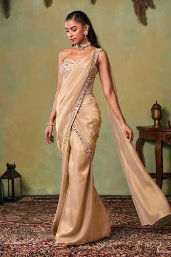 Seema Thukral Gold Satin, Tissue Embroidery Sweetheart Bella Pre-draped Saree And Corset Set at Aza Fashions Seema Thukral_Gold Satin, Tissue Embroidery Sweetheart Bella Pre-draped Saree And Corset Set _at_Aza_Fashions