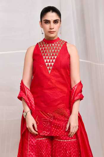 Naina Jain Red Silk High Neck, Yes Dhora Embroidered Kurta Gharara Set Online at Aza Fashions Naina Jain_Red Silk High Neck, Yes Dhora Embroidered Kurta Gharara Set _Online_at_Aza_Fashions