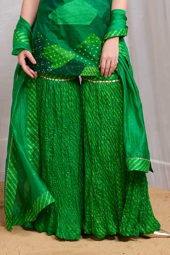 Naina Jain Green Silk High Neck Dhora Patchwork Short Kurta Gharara Set at Aza Fashions Naina Jain_Green Silk High Neck Dhora Patchwork Short Kurta Gharara Set _at_Aza_Fashions