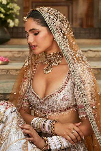 MATSYA_Ivory Silk Sweetheart Neck The Udaivan Embroidered Bridal Lehenga Set _Online_at_Aza_Fashions