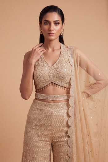Shop_Two Sisters By Gyans_Gold Georgette Sequins, Beads Halter Neck Hand Embroidered Top And Palazzo Set _Online_at_Aza_Fashions
