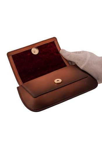 Saurav Ghosh_Brown Medallion Brooch Embellished Clutch _at_Aza_Fashions