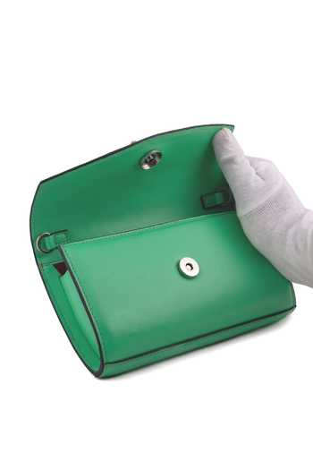 Saurav Ghosh_Green Metal Emblem Brooch Embellished Clutch _at_Aza_Fashions