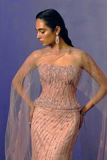 Dolly J Pink Tulle Sequins, Beads, Crystals Bandeau Neck Blush Mirage Corset And Skirt Set Online at Aza Fashions Dolly J_Pink Tulle Sequins, Beads, Crystals Bandeau Neck Blush Mirage Corset And Skirt Set _Online_at_Aza_Fashions