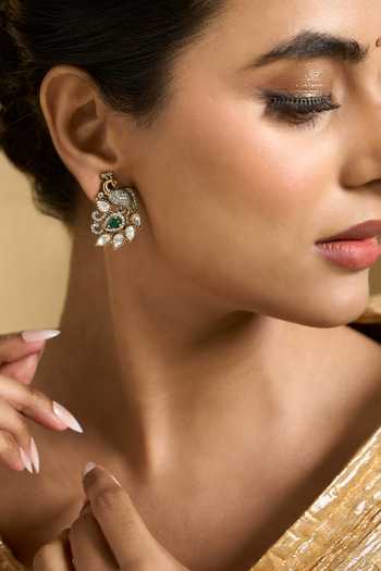 Nazaakat By Samara Singh Gold Plated Peacock Carved Earrings at Aza Fashions Nazaakat By Samara Singh_Gold Plated Peacock Carved Earrings _at_Aza_Fashions