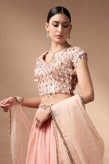 Rocky Star Peach Organza, Net V-neck Embroidered Blouse Lehenga Set at Aza Fashions Rocky Star_Peach Organza, Net V-neck Embroidered Blouse Lehenga Set _at_Aza_Fashions
