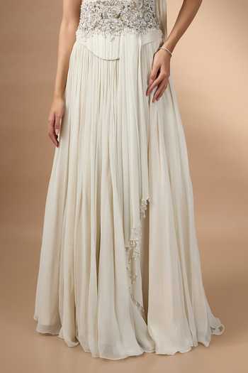 Rocky Star_Ivory Georgette Sequins, Beads, Stones Embroidered Corset And Skirt Set _at_Aza_Fashions