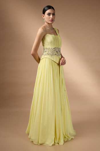 Rocky Star_Yellow Georgette Sequins, Beads, Stones Hand Embroidered Corset And Skirt Set _Online_at_Aza_Fashions