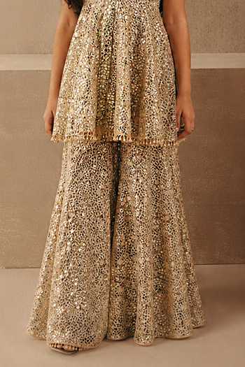 Twenty Nine Gold Net Mirror Work Peplum Top And Sharara Set Online at Aza Fashions Twenty Nine_Gold Net Mirror Work Peplum Top And Sharara Set _Online_at_Aza_Fashions