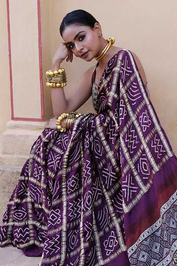 Shop Geroo Jaipur Wine Silk Sweetheart Ajrakh Bandhani Saree With Stitched Blouse And Petticoat Set Online at Aza Fashions Shop_Geroo Jaipur_Wine Silk Sweetheart Ajrakh Bandhani Saree With Stitched Blouse And Petticoat Set _Online_at_Aza_Fashions