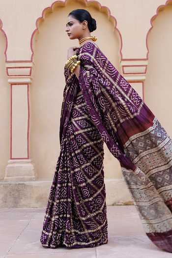 Geroo Jaipur Wine Silk Sweetheart Ajrakh Bandhani Saree With Stitched Blouse And Petticoat Set at Aza Fashions Geroo Jaipur_Wine Silk Sweetheart Ajrakh Bandhani Saree With Stitched Blouse And Petticoat Set _at_Aza_Fashions