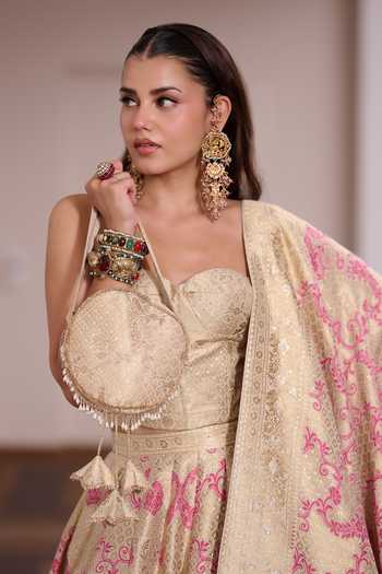 Shop_Safaa_Ivory Vegan Silk Tassels Sweetheart Neck Gulaabi Corset Lehenga Set _Online_at_Aza_Fashions